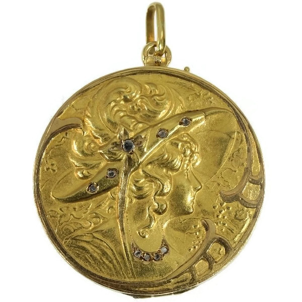 Late Victorian gold locket pendant set with rose cut diamonds